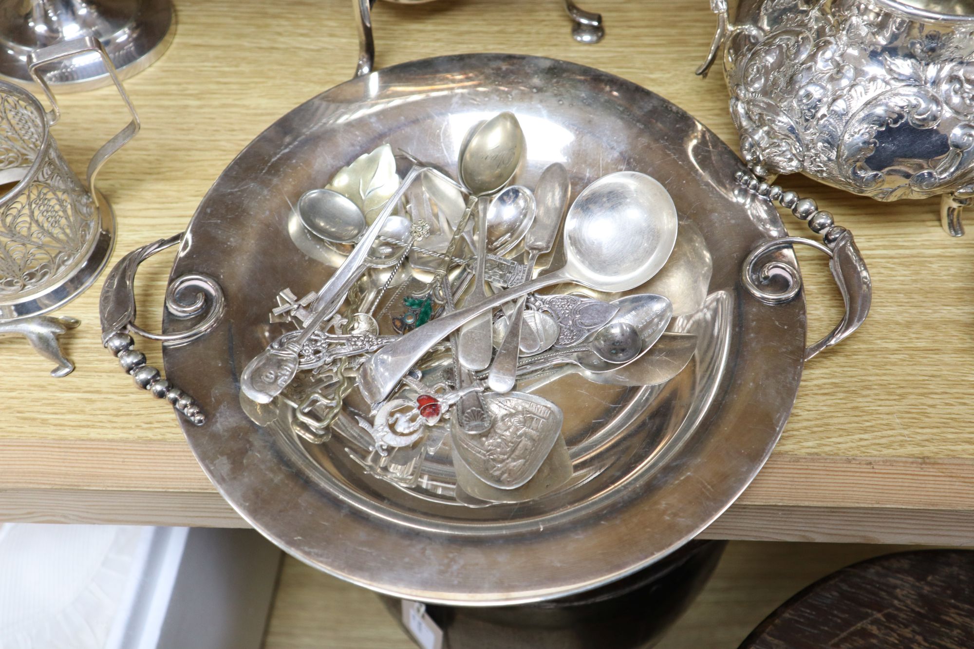 A three-piece plated teaset, sundry plated items and a leather box with plated mounts
